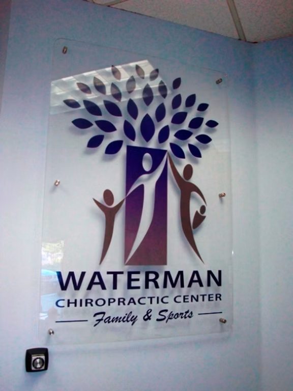 Chiropractic center interior logo wall sign